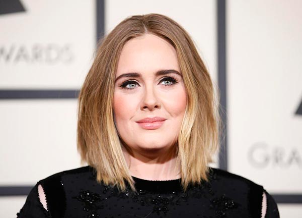 Adele says she battled depression, before and after son's birth