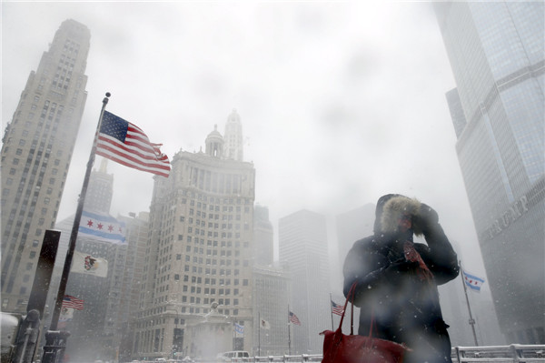 Snow blankets Chicago after spring storm