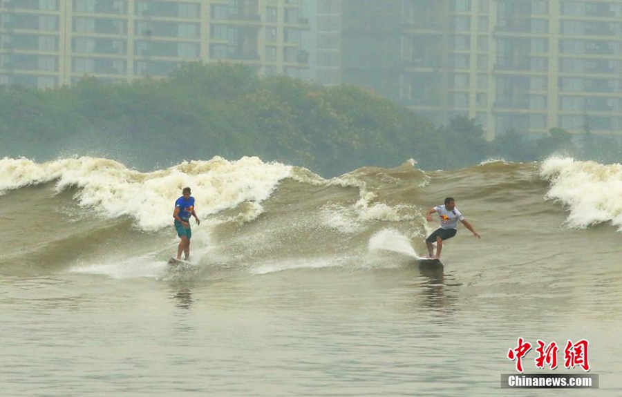 Surfing competition held on Qiantang River