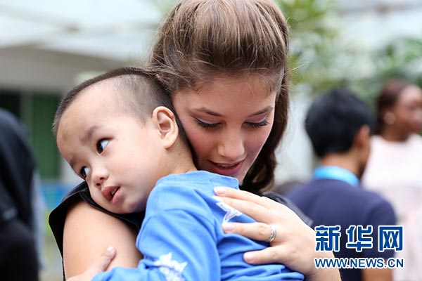 Miss World contestants visit welfare center in Hainan