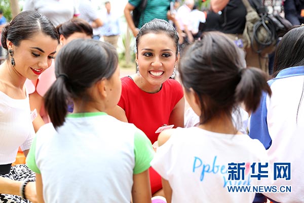 Miss World contestants visit welfare center in Hainan