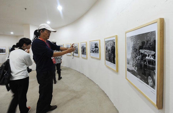 Xishuangbanna Int'l Photo Expo opens in Yunnan