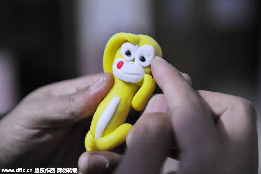 Vivid dough sculptures welcome Year of the Monkey