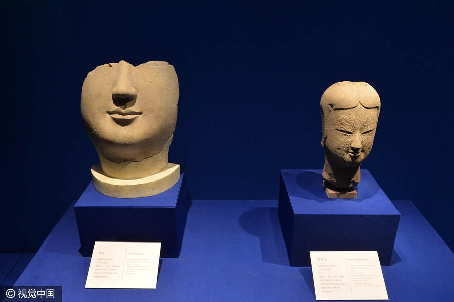 Chinese and Indian sculptures on display at the Palace Museum in Beijing