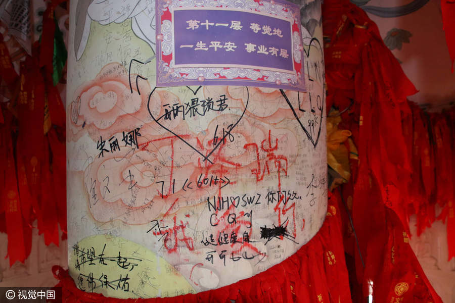 Thousand-year-old pagoda defaced by tourist graffiti
