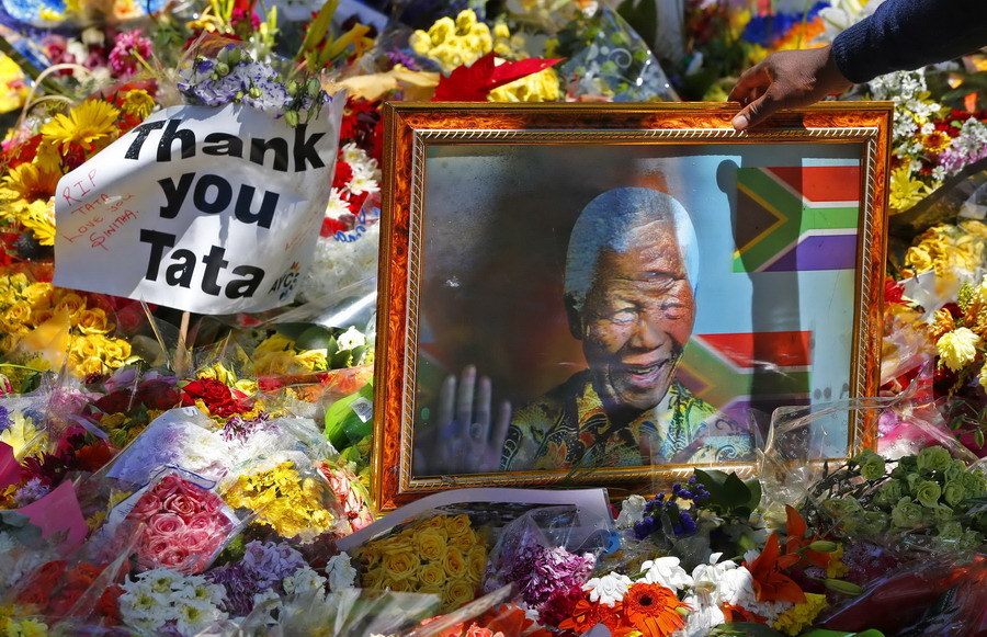 With a hole in its heart, South Africa buries Mandela