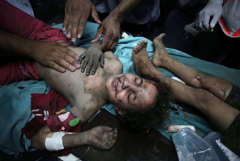 Children under air strike in Gaza