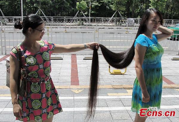 Woman auctions 2-meter-long hair for charity