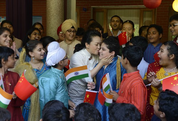 India smiles for China's First Lady