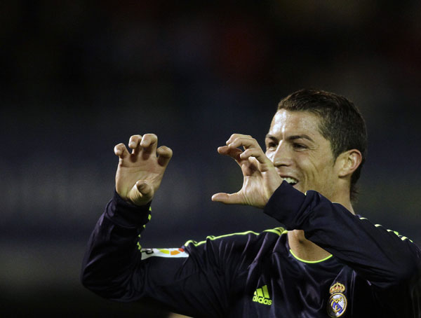 Ronaldo double lifts Real to second in La Liga