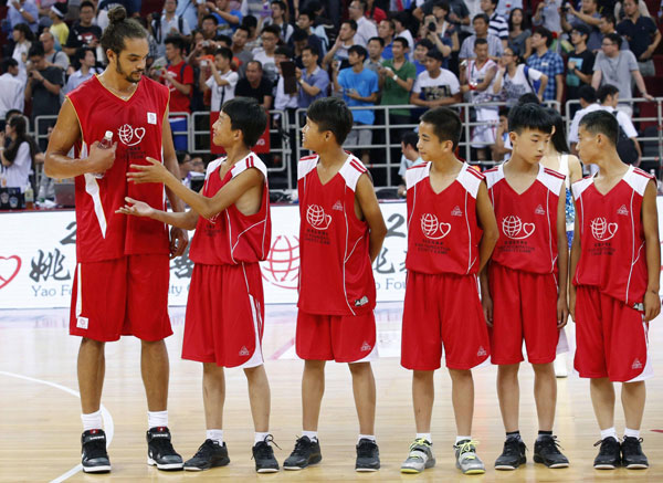 Yao Ming, McGrady team up for charity