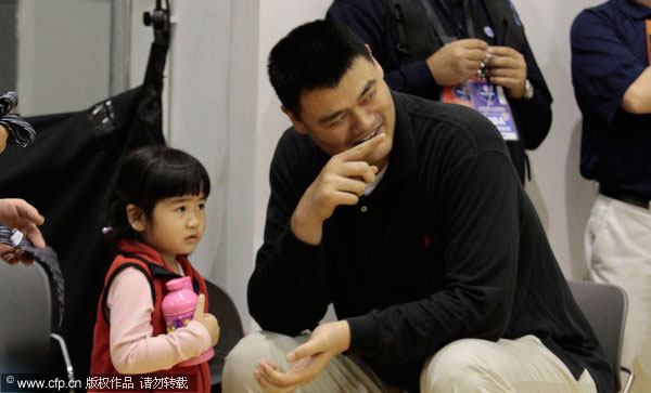 Yao with his daughter at the NBA Cares