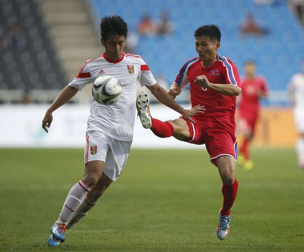 China loses Asian Games soccer opener 3-0