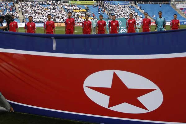 China loses Asian Games soccer opener 3-0