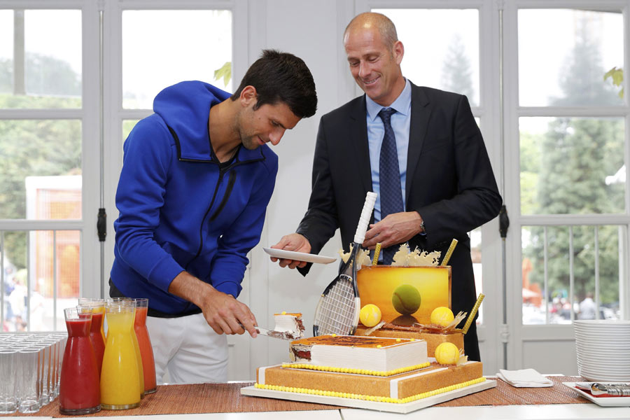 Djokovic marks his birthday at Roland Garros