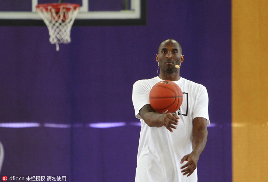Former NBA player Kobe instructs young players
