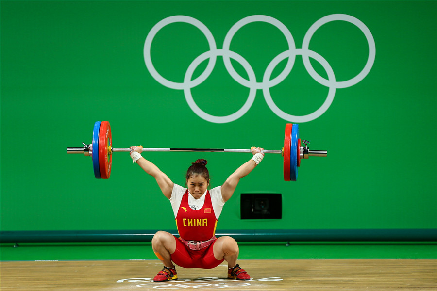 Weightlifter Deng Wei breaks world records