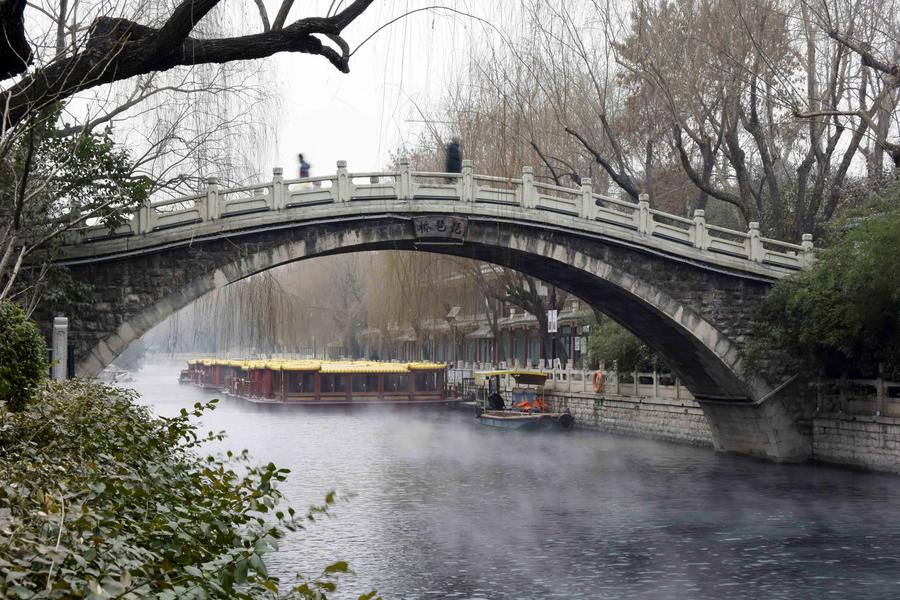 Scenery of mist-enveloped Baishi Spring in Jinan