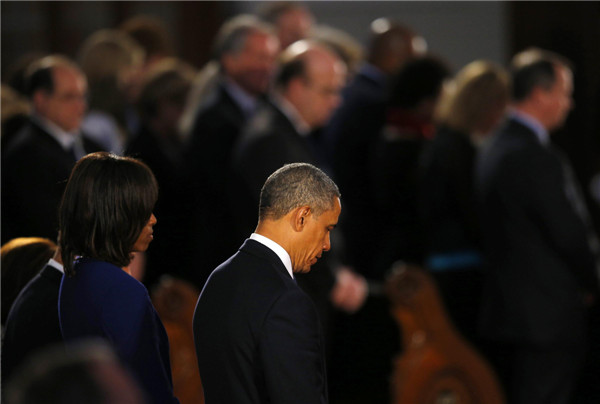 Obama attends Boston service