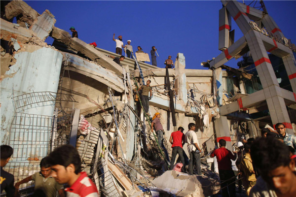 Bangladesh building collapse kills nearly 100