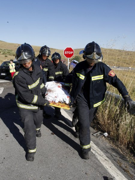 At least 9 killed in bus crash in Central Spain