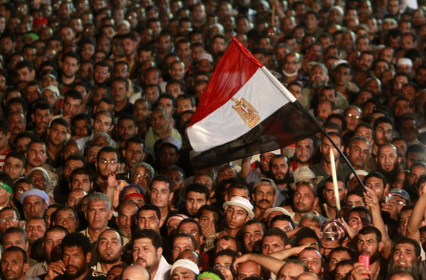 Egyptian forces kill dozens of supporters of Morsi