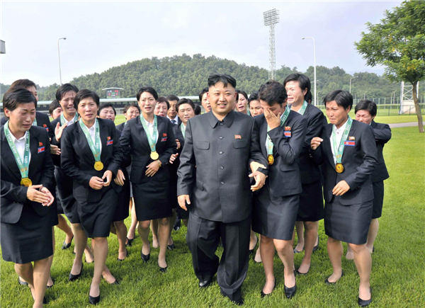 DPRK's Kim Jong-un meets with national athletes