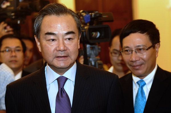 Chinese FM Wang aims above regional rows