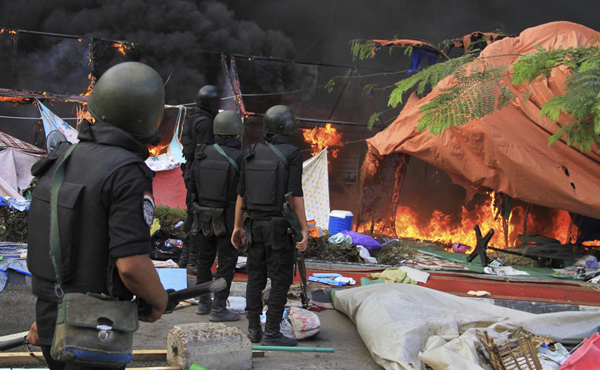 At least 15 killed as Egypt troops storm pro-Morsi camps