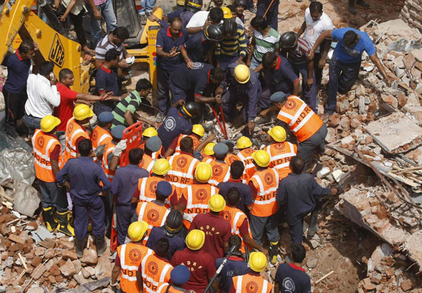 8 killed in twin building collapse in India