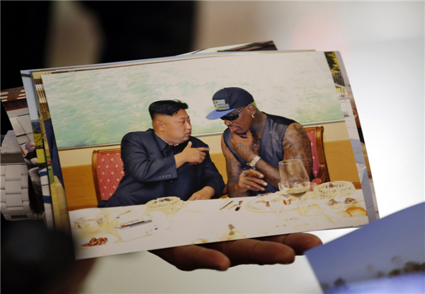DPRK top leader meets visiting Rodman
