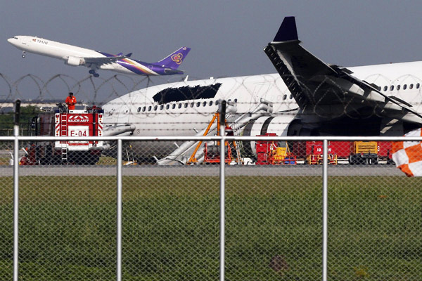 Plane skids off Bangkok runway, 13 injured