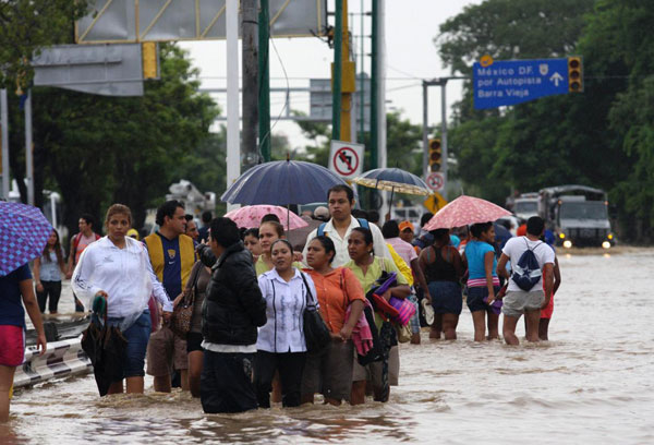 Tropical storms lash Mexico