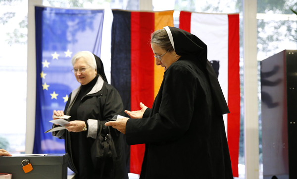 Polls open in Germany's parliamentary vote