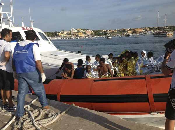 Death toll in Italy migrant boat wreck rises to 94, hundreds more missing