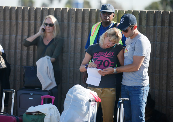 Multiple victims in shooting at L.A. airport; suspected gunman held