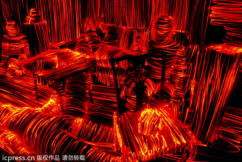 Artist uses light to create ghostly images