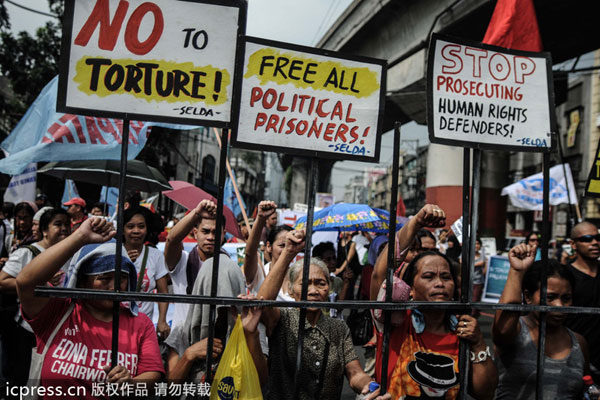 Philippine protesters mark Human Rights Day