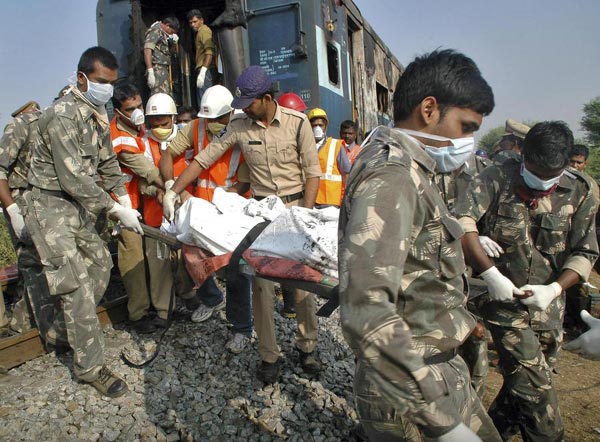 Fire on express train in India kills at least 26