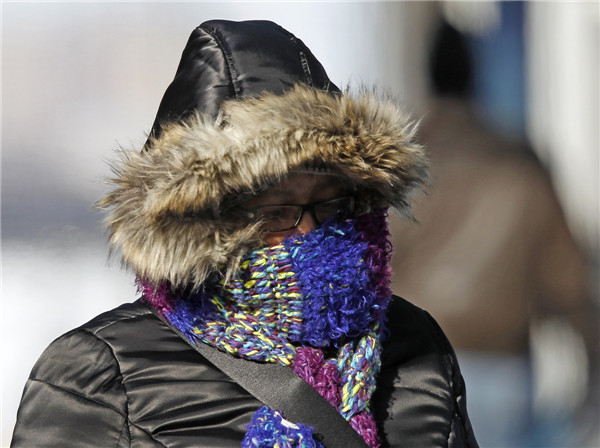 Cold shuts schools, delays travel in US Midwest