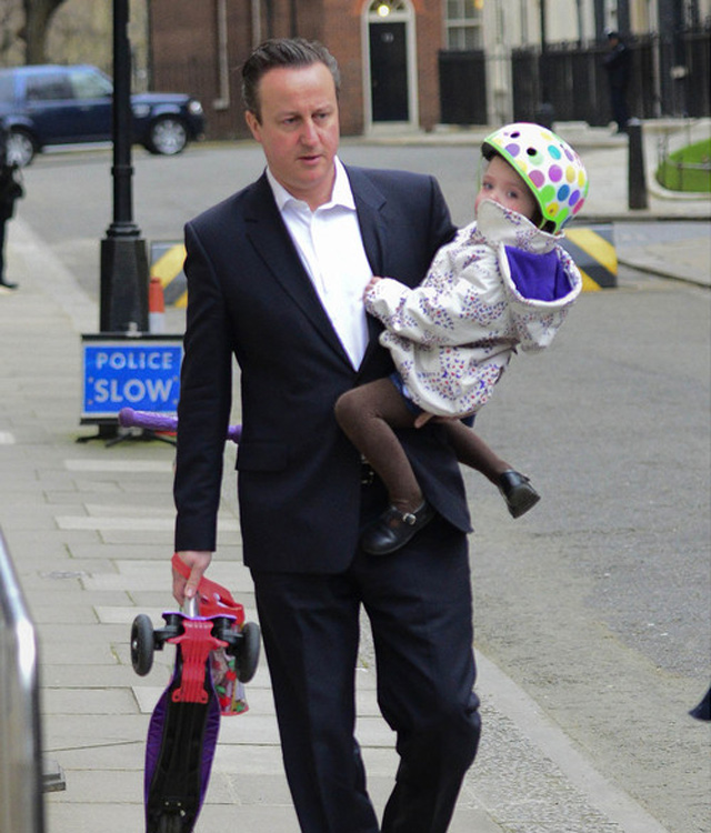 Cameron walks his daughter to nursery school