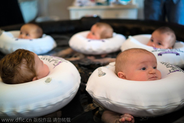 Babies bob about in water at US's first baby spa