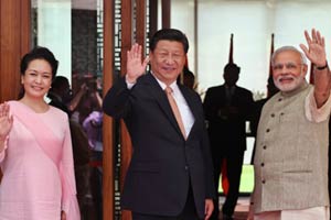 China, India vow to further bilateral ties