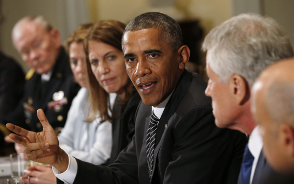 Obama vows more aggressive response to Ebola fears
