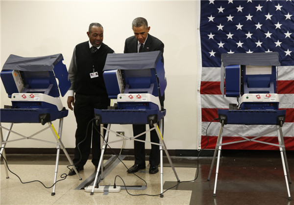 Obama votes early in Chicago, encourages others to follow