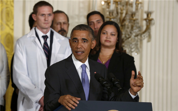 Obama praises health workers fighting Ebola as 'heroes'