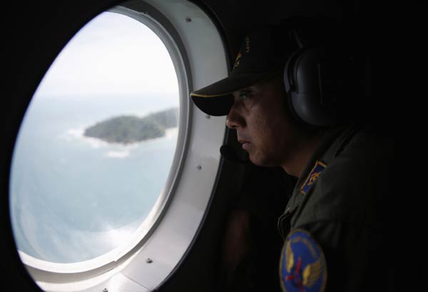 Divers set to search for AirAsia wreckage after debris, bodies found
