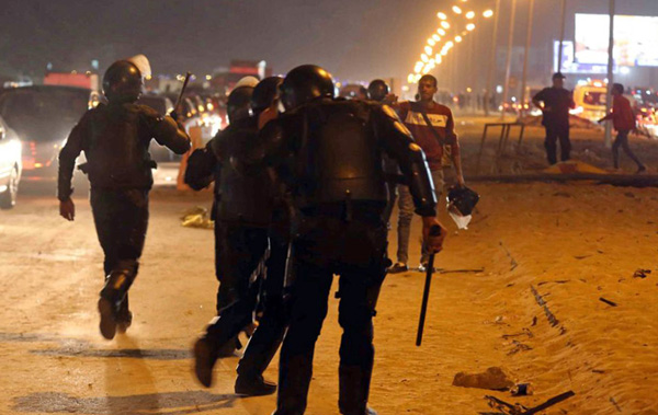 At least 22 Egyptian soccer fans killed in clashes with police