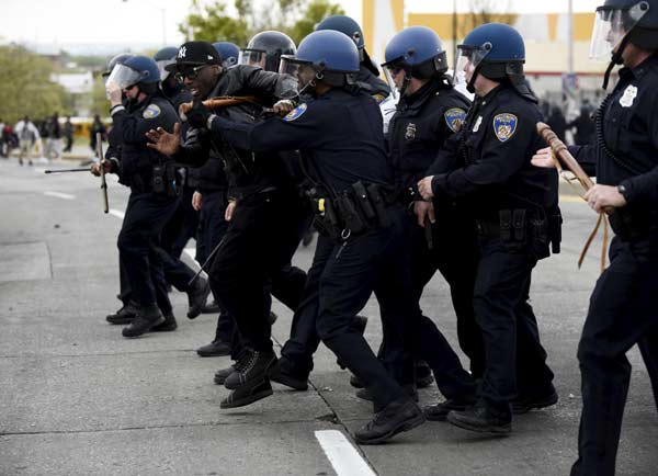 Riot, looting prompt state of emergency, curfew in Baltimore