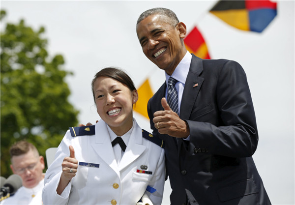 Obama tells Coast Guard grads climate change threatens US